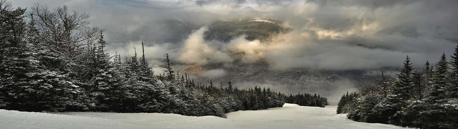 Attitash and Wildcat School Ski Trips, View from summit of Wildcat ski area in New Hampshire at early winter and Wildcat School Ski Trips, View from summit of Wildcat ski area in New Hampshire at early winter